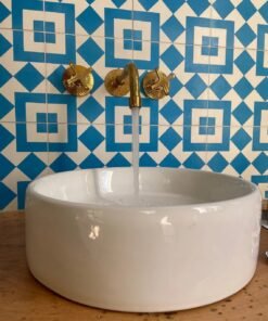 Unlacquered brass vintage wall mounted bathroom faucet with hammered finish & flat cross handles